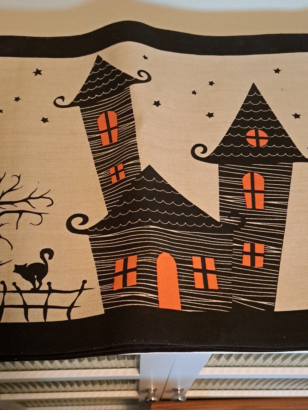 Kirklands Black and Orange Haunted House Holiday Table Runner